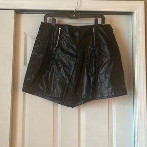 Never worn Fake leather shorts with silver zipper accents on the side